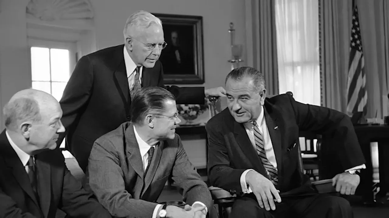 President Johnson discussing Vietnam strategy with advisors
