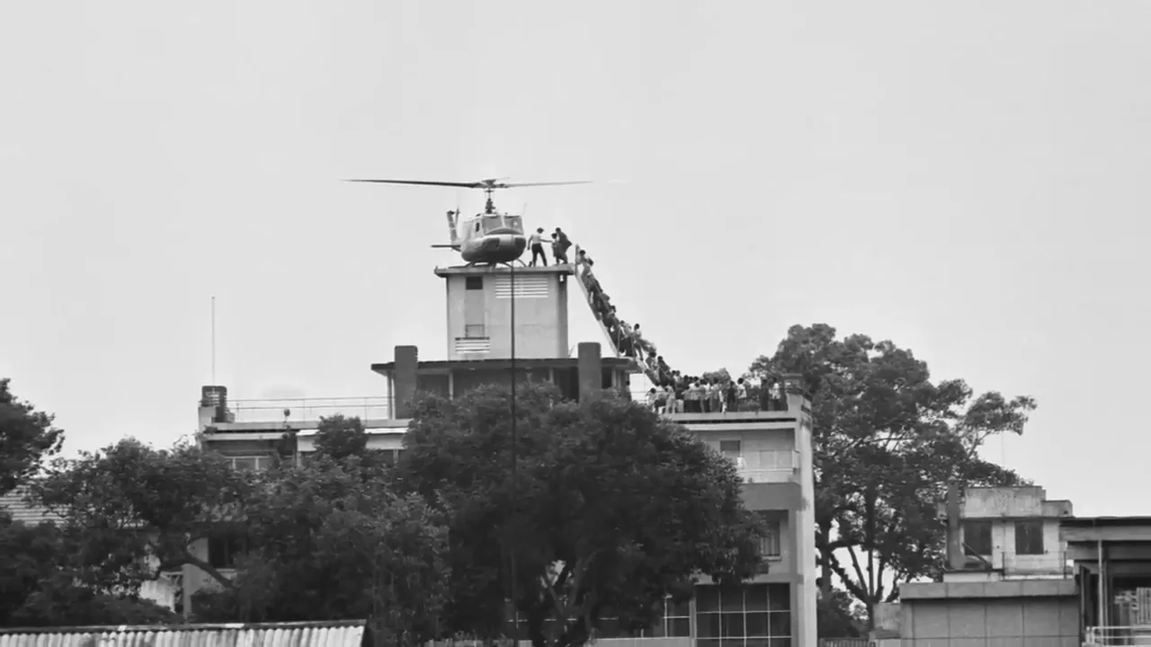 Helicopter evacuating people from Saigon rooftop