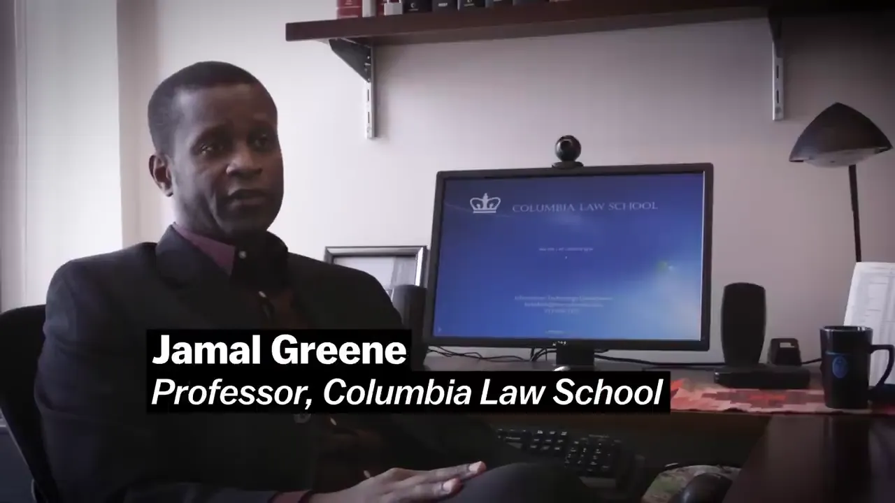 A computer screen displays the "Columbia Law School" logo and text, indicating it's a visual aid.