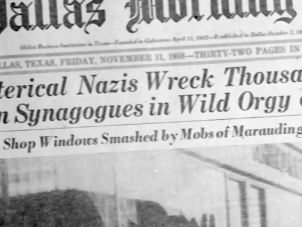 A newspaper headline reads "Historical Nazis Wreck Thousands in Synagogues in Wild Orgy" and "Shop Windows Smashed by Mobs of Marauding".